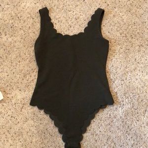 Green scalloped body suit